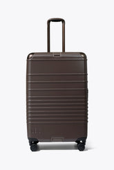 The Hybrid Check-In Roller in Espresso