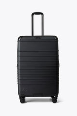 The Hybrid Check-In Roller in Black